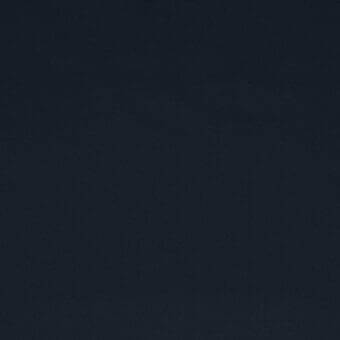 Dark blue stretchy fabric with a tightly woven, raised texture and subtle grid pattern, studio shot against a neutral backdrop.